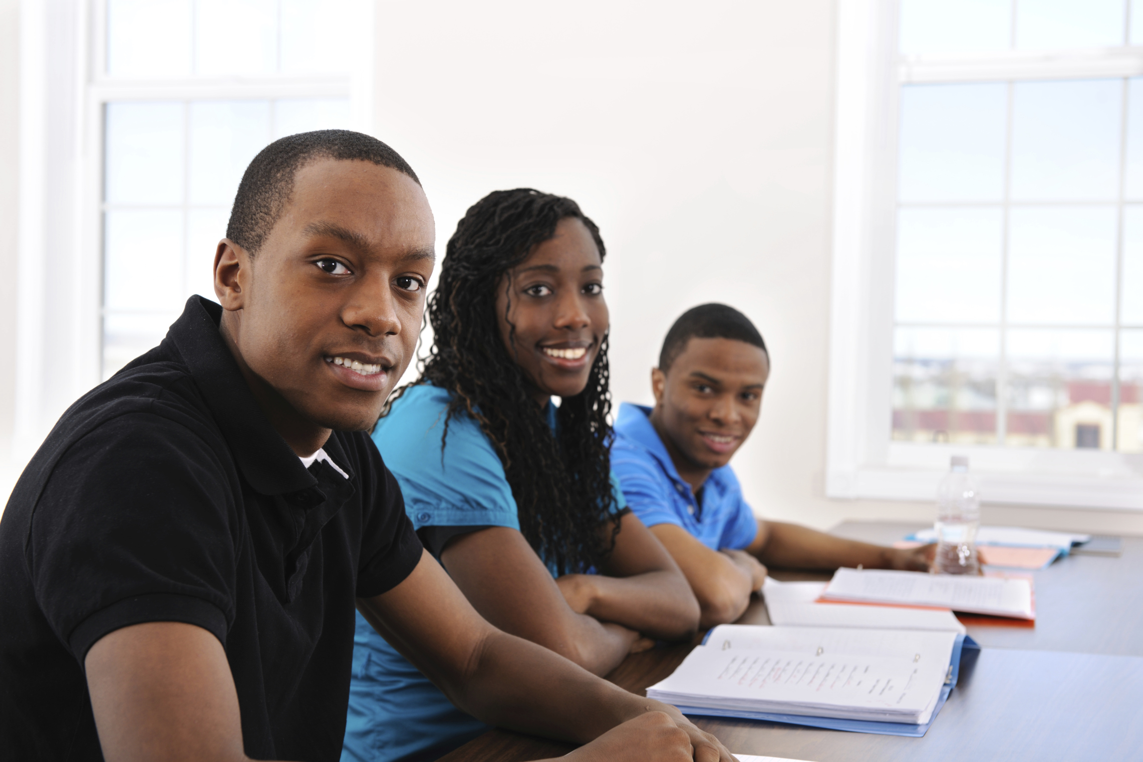 African American university students in a classroom.